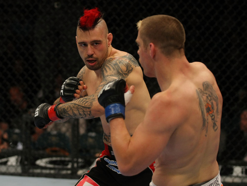 LAS VEGAS, NV - MAY 26:  Dan Hardy (L) throws a punch at Duane Ludwig during a welterweight bout at UFC 146 at MGM Grand Garden Arena on May 26, 2012 in Las Vegas, Nevada.  (Photo by Donald Miralle/Zuffa LLC/Zuffa LLC via Getty Images)