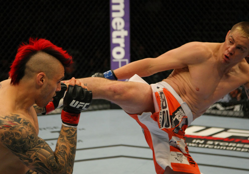 LAS VEGAS, NV - MAY 26:  Duane Ludwig (right) kicks Dan Hardy during a welterweight bout at UFC 146 at MGM Grand Garden Arena on May 26, 2012 in Las Vegas, Nevada.  (Photo by Donald Miralle/Zuffa LLC/Zuffa LLC via Getty Images)