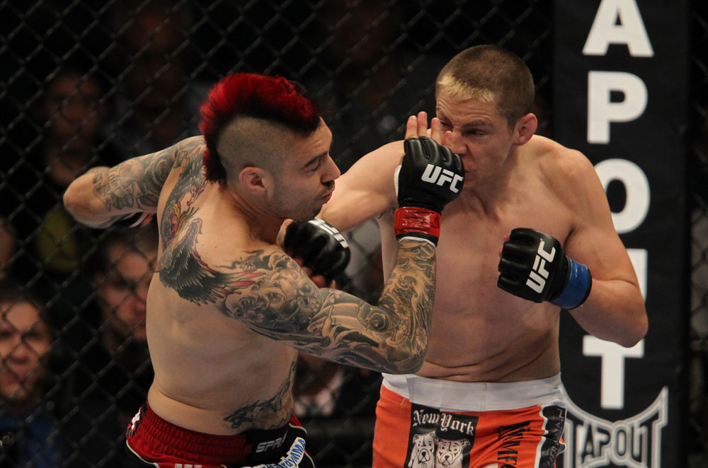 LAS VEGAS, NV - MAY 26:  Duane Ludwig (right) punches Dan Hardy during a welterweight bout at UFC 146 at MGM Grand Garden Arena on May 26, 2012 in Las Vegas, Nevada.  (Photo by Josh Hedges/Zuffa LLC/Zuffa LLC via Getty Images)