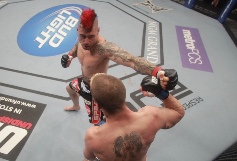 LAS VEGAS, NV - MAY 26:  Dan Hardy (top) punches Duane Ludwig during a lightweight bout at UFC 146 at MGM Grand Garden Arena on May 26, 2012 in Las Vegas, Nevada.  (Photo by Donald Miralle/Zuffa LLC/Zuffa LLC via Getty Images)