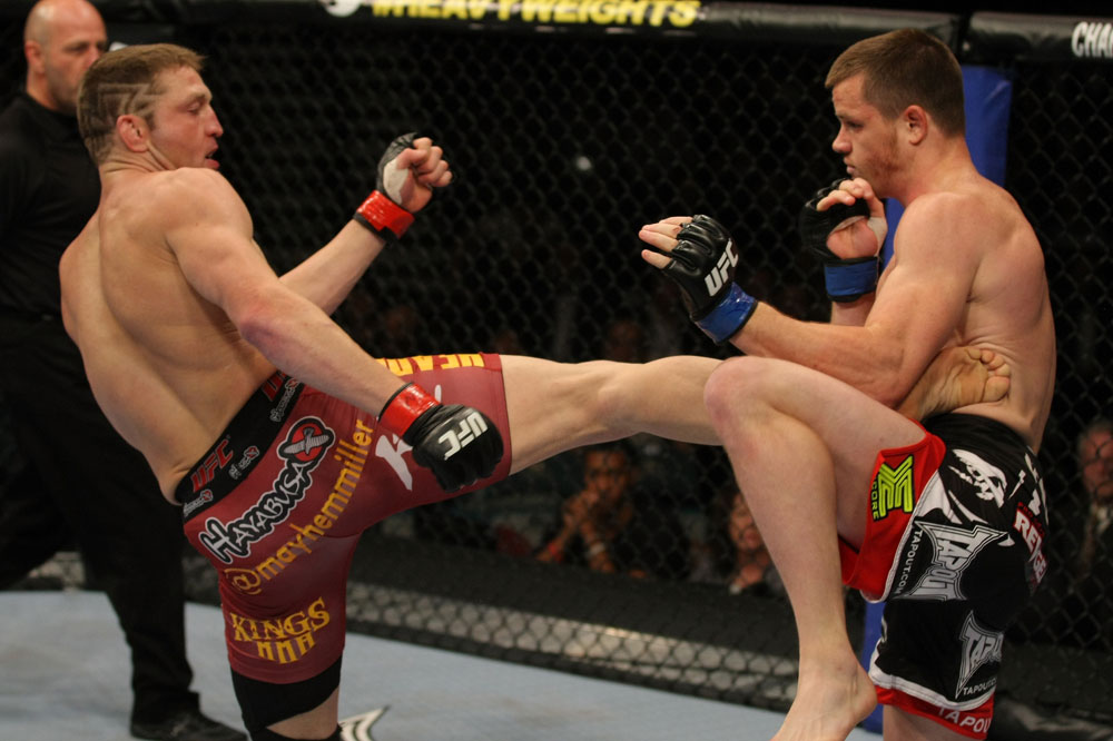 LAS VEGAS, NV - MAY 26:  Jason Miller (L) kicks CB Dollaway during a middleweight bout at UFC 146 at MGM Grand Garden Arena on May 26, 2012 in Las Vegas, Nevada.  (Photo by Donald Miralle/Zuffa LLC/Zuffa LLC via Getty Images)