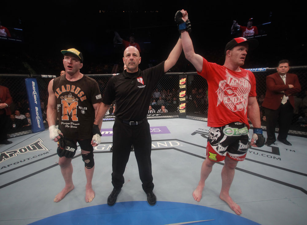 LAS VEGAS, NV - MAY 26:  CB Dollaway (R) is declared the winner against Jason Miller (L) during a middleweight bout at UFC 146 at MGM Grand Garden Arena on May 26, 2012 in Las Vegas, Nevada.  (Photo by Donald Miralle/Zuffa LLC/Zuffa LLC via Getty Images)