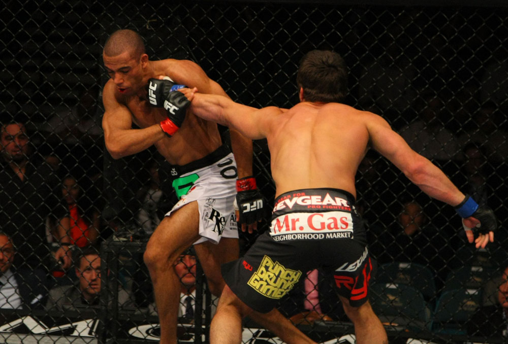 LAS VEGAS, NV - MAY 26:  Jamie Varner (R) punches Edson Barboza during a lightweight bout at UFC 146 at MGM Grand Garden Arena on May 26, 2012 in Las Vegas, Nevada.  (Photo by Donald Miralle/Zuffa LLC/Zuffa LLC via Getty Images)