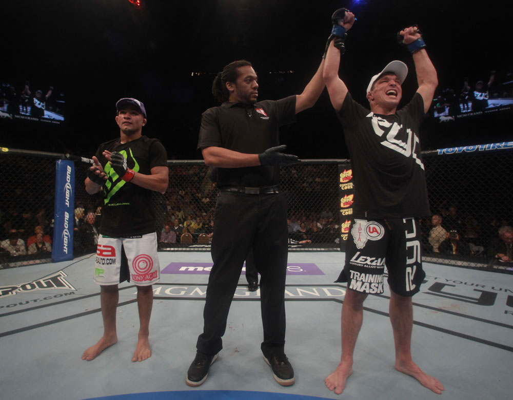 LAS VEGAS, NV - MAY 26:  Darren Elkins (R) is declared the winner in his fight against Diego Brandao during a featherweight bout at UFC 146 at MGM Grand Garden Arena on May 26, 2012 in Las Vegas, Nevada.  (Photo by Donald Miralle/Zuffa LLC/Zuffa LLC via Getty Images)