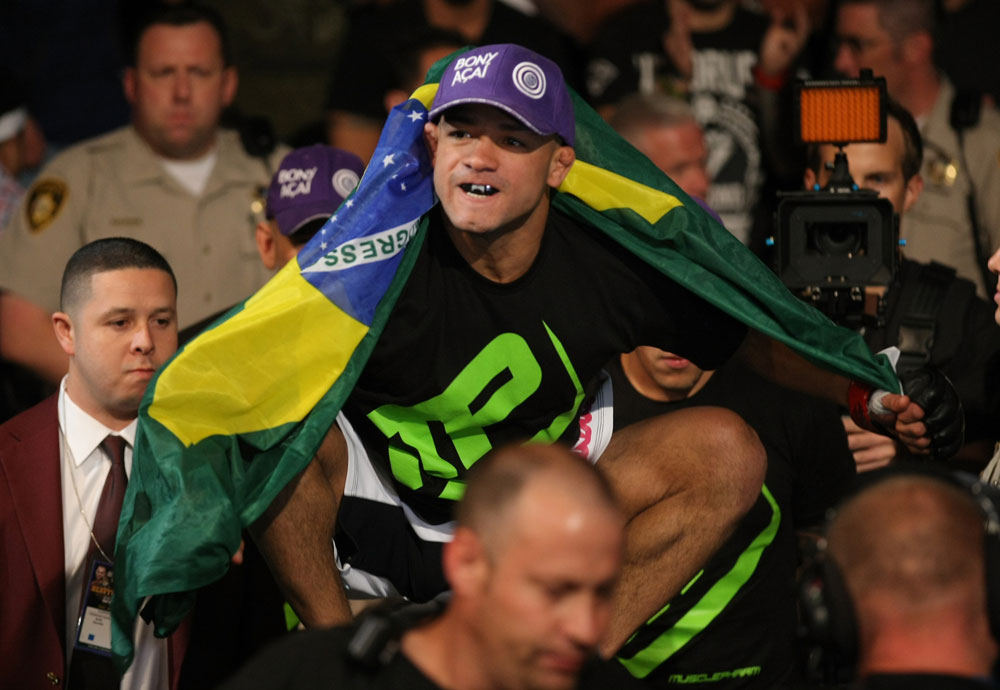 LAS VEGAS, NV - MAY 26:  Diego Brandao (C) walks towards the Octagon during a featherweight bout at UFC 146 at MGM Grand Garden Arena on May 26, 2012 in Las Vegas, Nevada.  (Photo by Donald Miralle/Zuffa LLC/Zuffa LLC via Getty Images)