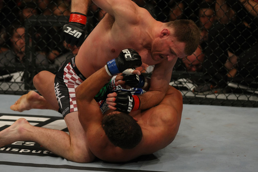 LAS VEGAS, NV - MAY 26:  Stipe Miocic (top) punches Shane Del Rosario during a heavyweight bout at UFC 146 at MGM Grand Garden Arena on May 26, 2012 in Las Vegas, Nevada.  (Photo by Donald Miralle/Zuffa LLC/Zuffa LLC via Getty Images)