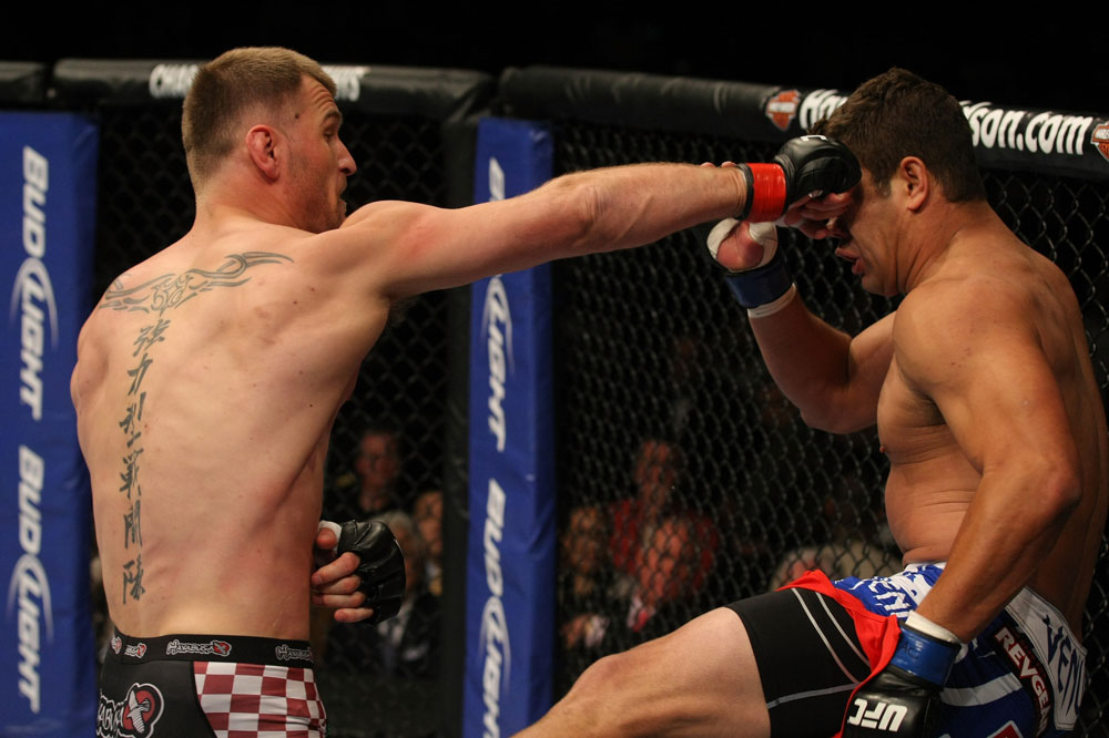 LAS VEGAS, NV - MAY 26:  Stipe Miocic (L) punches Shane Del Rosario during a heavyweight bout at UFC 146 at MGM Grand Garden Arena on May 26, 2012 in Las Vegas, Nevada.  (Photo by Donald Miralle/Zuffa LLC/Zuffa LLC via Getty Images)