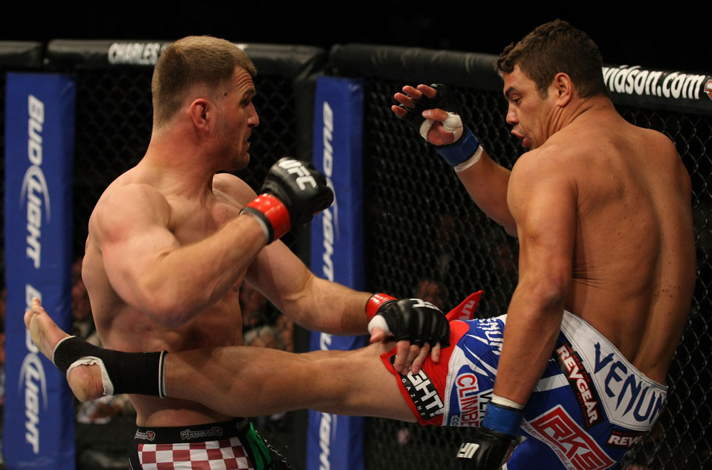 LAS VEGAS, NV - MAY 26:  Shane Del Rosario (R) kicks Stipe Miocic during a heavyweight bout at UFC 146 at MGM Grand Garden Arena on May 26, 2012 in Las Vegas, Nevada.  (Photo by Donald Miralle/Zuffa LLC/Zuffa LLC via Getty Images)
