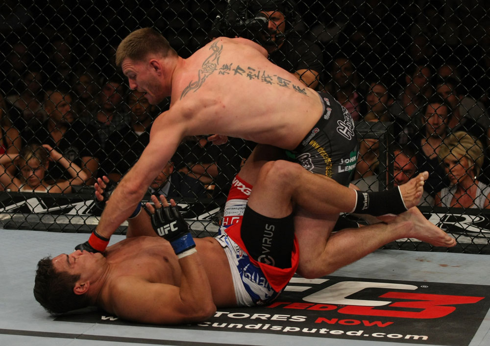 LAS VEGAS, NV - MAY 26:  Stipe Miocic (top) punches Shane Del Rosario during a heavyweight bout at UFC 146 at MGM Grand Garden Arena on May 26, 2012 in Las Vegas, Nevada.  (Photo by Donald Miralle/Zuffa LLC/Zuffa LLC via Getty Images)