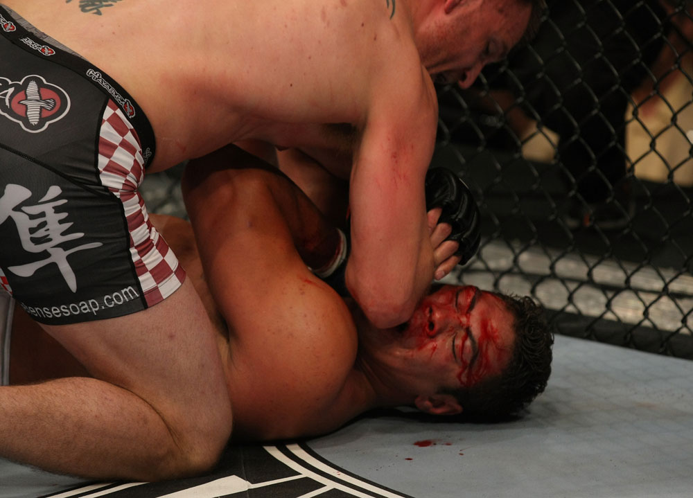 LAS VEGAS, NV - MAY 26:  Stipe Miocic (top) elbows Shane Del Rosario during a heavyweight bout at UFC 146 at MGM Grand Garden Arena on May 26, 2012 in Las Vegas, Nevada.  (Photo by Donald Miralle/Zuffa LLC/Zuffa LLC via Getty Images)