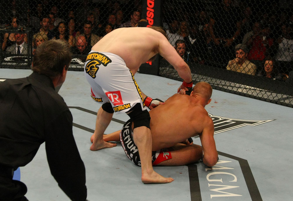 LAS VEGAS, NV - MAY 26:  Roy Nelson (white shorts) punches Dave Herman during a heavyweight bout at UFC 146 at MGM Grand Garden Arena on May 26, 2012 in Las Vegas, Nevada.  (Photo by Donald Miralle/Zuffa LLC/Zuffa LLC via Getty Images)