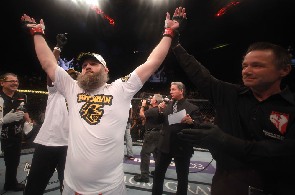 LAS VEGAS, NV - MAY 26:  Referee Steve Mazzagatti (R) raises Roy Nelson's (L) hand after his knockout victory over Dave Herman during a heavyweight bout at UFC 146 at MGM Grand Garden Arena on May 26, 2012 in Las Vegas, Nevada.  (Photo by Donald Miralle/Zuffa LLC/Zuffa LLC via Getty Images)