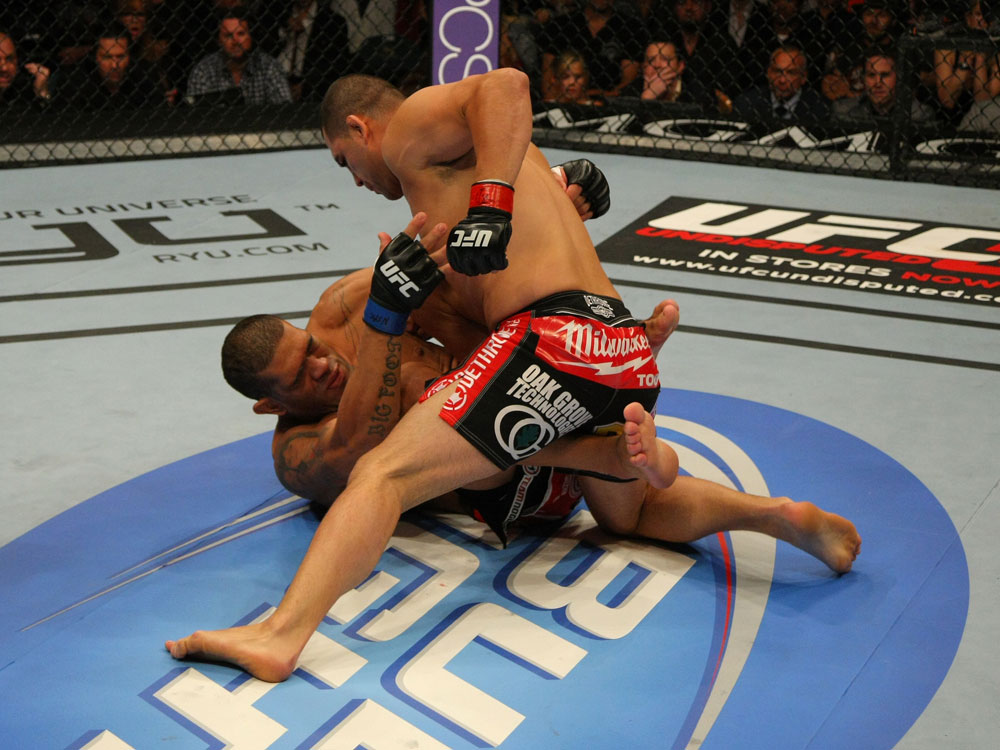 LAS VEGAS, NV - MAY 26:  Cain Velasquez (top) punches Antonio Silva during a heavyweight bout at UFC 146 at MGM Grand Garden Arena on May 26, 2012 in Las Vegas, Nevada.  (Photo by Donald Miralle/Zuffa LLC/Zuffa LLC via Getty Images)