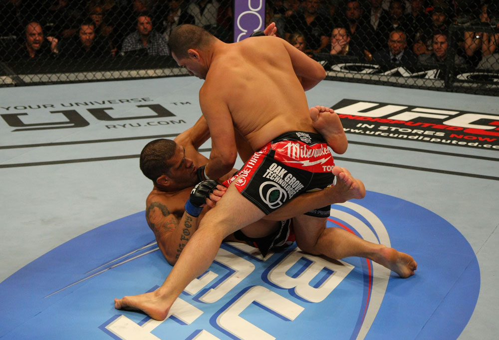 LAS VEGAS, NV - MAY 26:  Cain Velasquez (top) punches Antonio Silva during a heavyweight bout at UFC 146 at MGM Grand Garden Arena on May 26, 2012 in Las Vegas, Nevada.  (Photo by Donald Miralle/Zuffa LLC/Zuffa LLC via Getty Images)