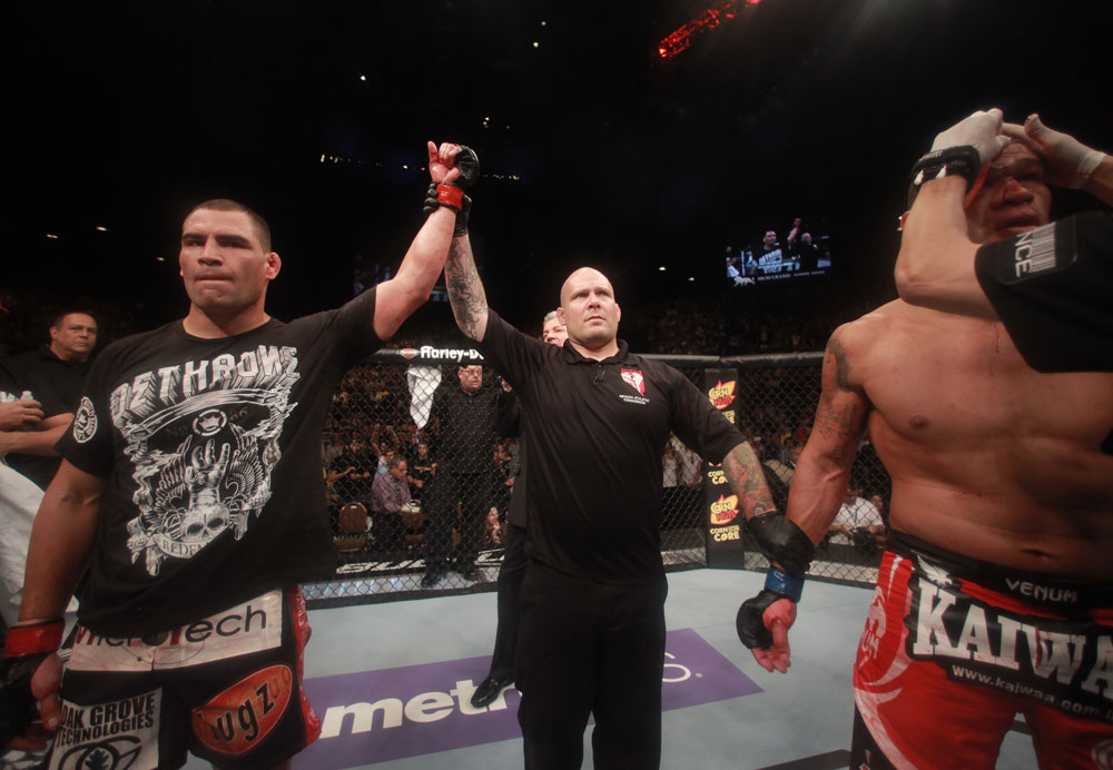 LAS VEGAS, NV - MAY 26:  Cain Velasquez (L) has his hand raised after defeating Antonio Silva (R) during a heavyweight bout at UFC 146 at MGM Grand Garden Arena on May 26, 2012 in Las Vegas, Nevada.  (Photo by Donald Miralle/Zuffa LLC/Zuffa LLC via Getty Images)