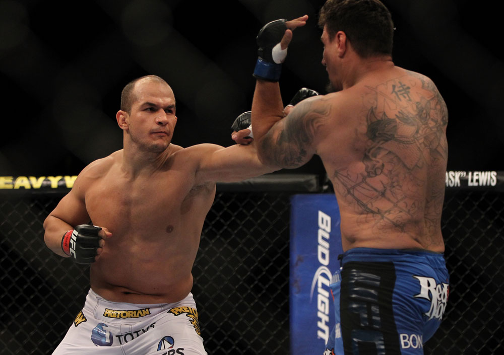 LAS VEGAS, NV - MAY 26:  (L-R) Junior dos Santos punches Frank Mir during the Heavyweight Championship bout at UFC 146 at MGM Grand Garden Arena on May 26, 2012 in Las Vegas, Nevada.  (Photo by Josh Hedges/Zuffa LLC/Zuffa LLC via Getty Images)