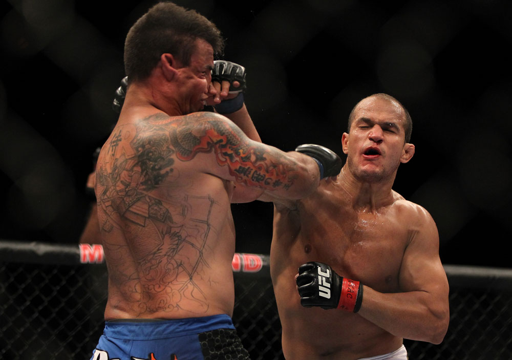 LAS VEGAS, NV - MAY 26:  (R-L) Junior dos Santos punches Frank Mir during the Heavyweight Championship bout at UFC 146 at MGM Grand Garden Arena on May 26, 2012 in Las Vegas, Nevada.  (Photo by Josh Hedges/Zuffa LLC/Zuffa LLC via Getty Images)