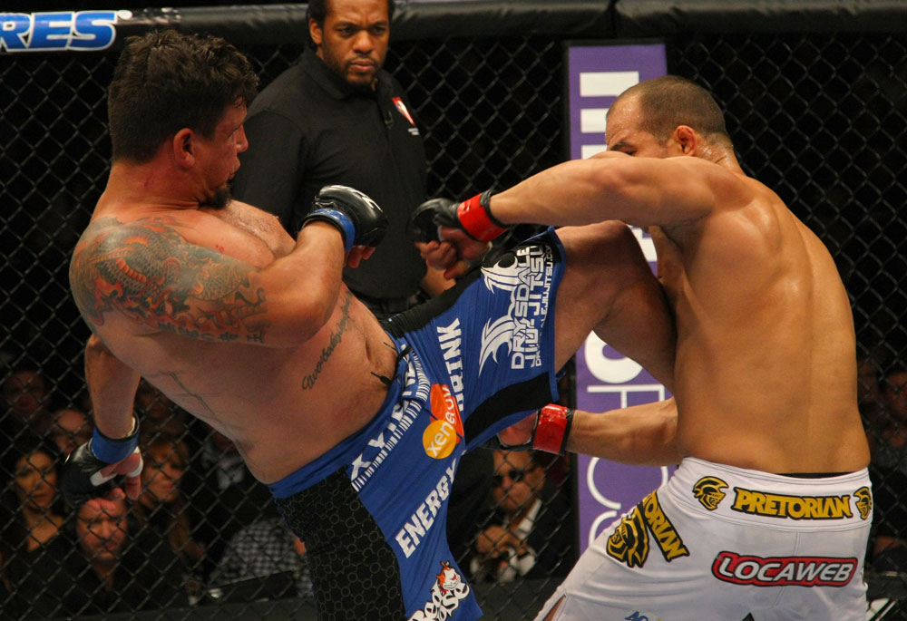 LAS VEGAS, NV - MAY 26:  Frank Mir (L) kicks Junior dos Santos during the Heavyweight Championship bout at UFC 146 at MGM Grand Garden Arena on May 26, 2012 in Las Vegas, Nevada. (Photo by Donald Miralle/Zuffa LLC/Zuffa LLC via Getty Images)