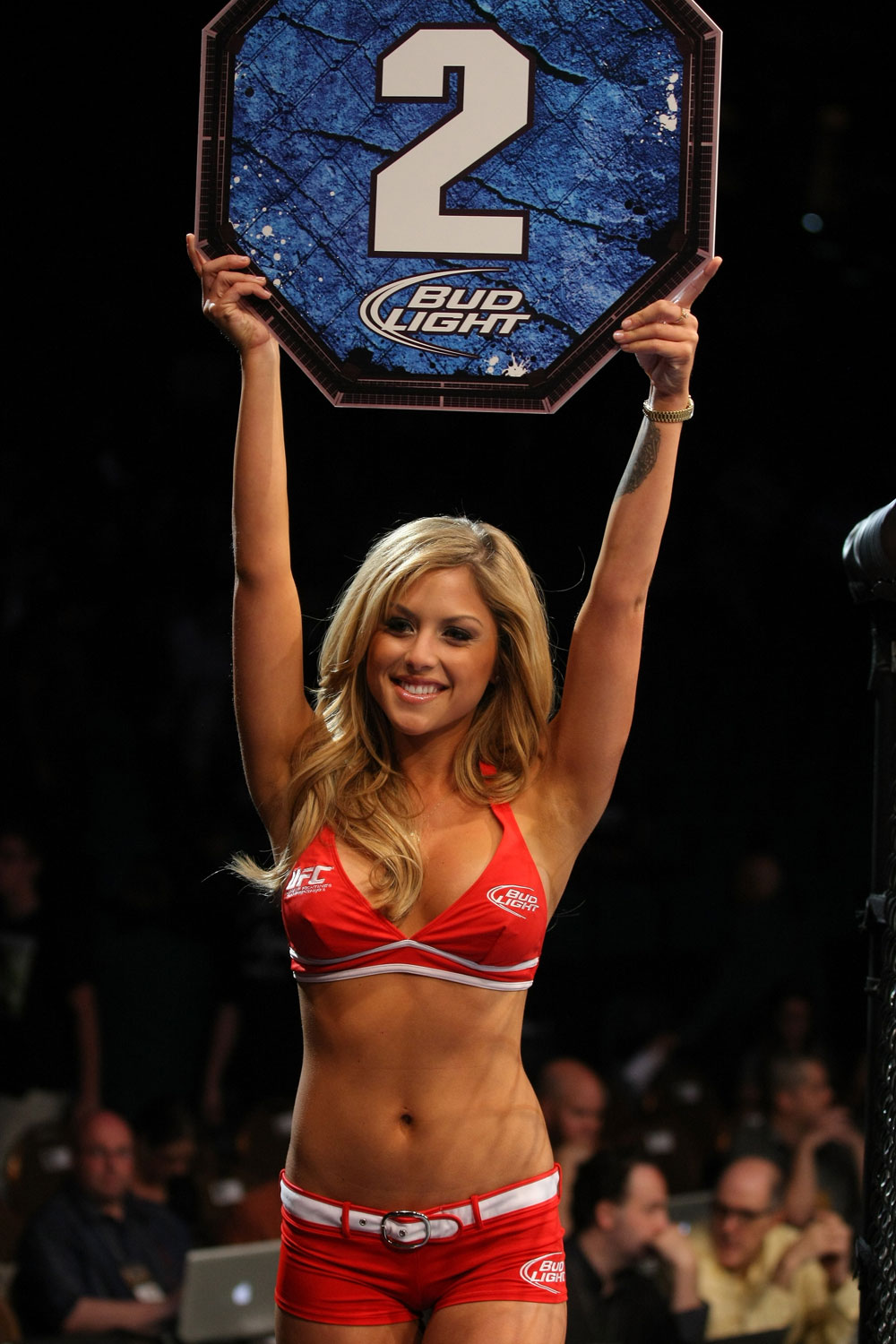 LAS VEGAS, NV - MAY 26: UFC Octagon Girl Brittney Palmer introduces round three during a featherweight bout at UFC 146 at MGM Grand Garden Arena on May 26, 2012 in Las Vegas, Nevada. (Photo by Josh Hedges/Zuffa LLC/Zuffa LLC via Getty Images)