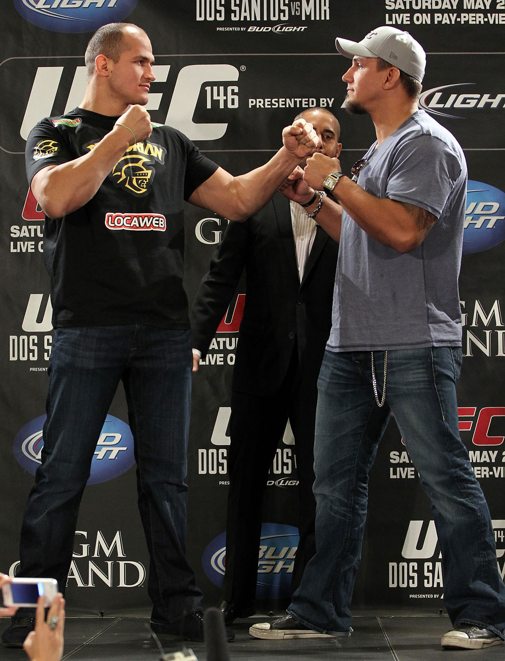 LAS VEGAS, NV - MAY 24: (L-R) UFC Heavyweight Champion Junior dos Santos and challenger Frank Mir face off during the UFC 146 press conference at MGM Grand on May 24, 2012 in Las Vegas, Nevada. (Photo by Josh Hedges/Zuffa LLC/Zuffa LLC via Getty Images)