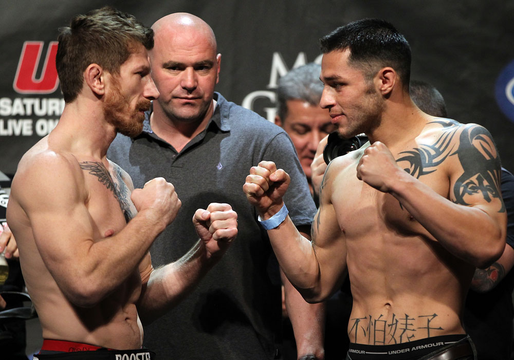 LAS VEGAS, NV - MAY 25: (L-R) Opponents Mike Brown and Daniel Pineda face off after making weight during the UFC 146 official weigh in at the MGM Grand Garden Arena on May 25, 2012 in Las Vegas, Nevada. (Photo by Josh Hedges/Zuffa LLC/Zuffa LLC via Getty Images)