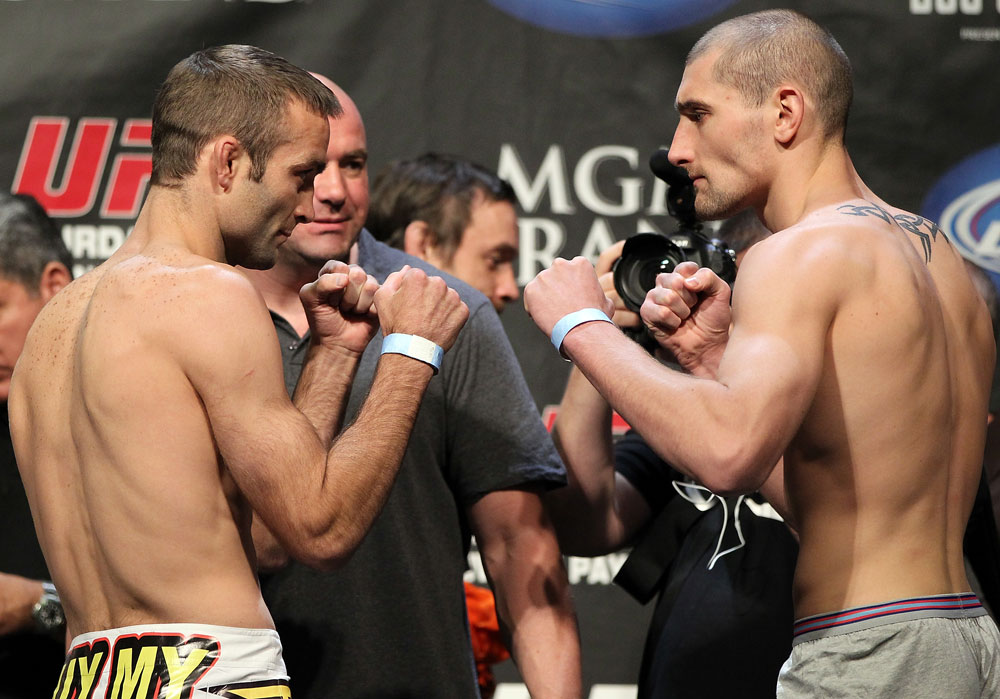 LAS VEGAS, NV - MAY 25:   (L-R) Opponents Jacob Volkmann and Paul Sass face off after making weight during the UFC 146 official weigh in at the MGM Grand Garden Arena on May 25, 2012 in Las Vegas, Nevada.  (Photo by Josh Hedges/Zuffa LLC/Zuffa LLC via Getty Images)