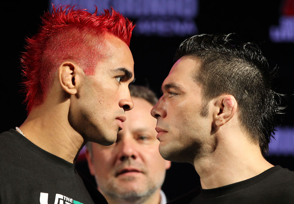 BELO HORIZONTE, BRAZIL - JUNE 21:   (L-R) Opponents Godofredo Pepey and Rony "Jason" Mariano Bezerra face off during the UFC 147 press conference at Ouro Minas Palace on June 21, 2012 in Belo Horizonte, Brazil.  (Photo by Josh Hedges/Zuffa LLC/Zuffa LLC via Getty Images)