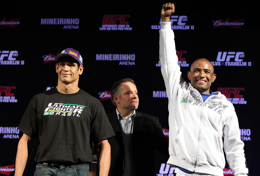 BELO HORIZONTE, BRAZIL - JUNE 21:   (L-R) Opponents Cezar "Mutante" Ferreira and Sergio "Serginho" Moraes pose for photos during the UFC 147 press conference at Ouro Minas Palace on June 21, 2012 in Belo Horizonte, Brazil.  (Photo by Josh Hedges/Zuffa LLC/Zuffa LLC via Getty Images)