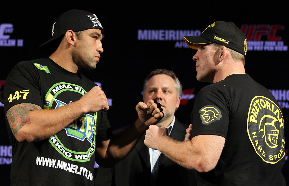 BELO HORIZONTE, BRAZIL - JUNE 21:   (L-R) Heavyweight opponents Fabricio Werdum and Mike Russow face off during the UFC 147 press conference at Ouro Minas Palace on June 21, 2012 in Belo Horizonte, Brazil.  (Photo by Josh Hedges/Zuffa LLC/Zuffa LLC via Getty Images)