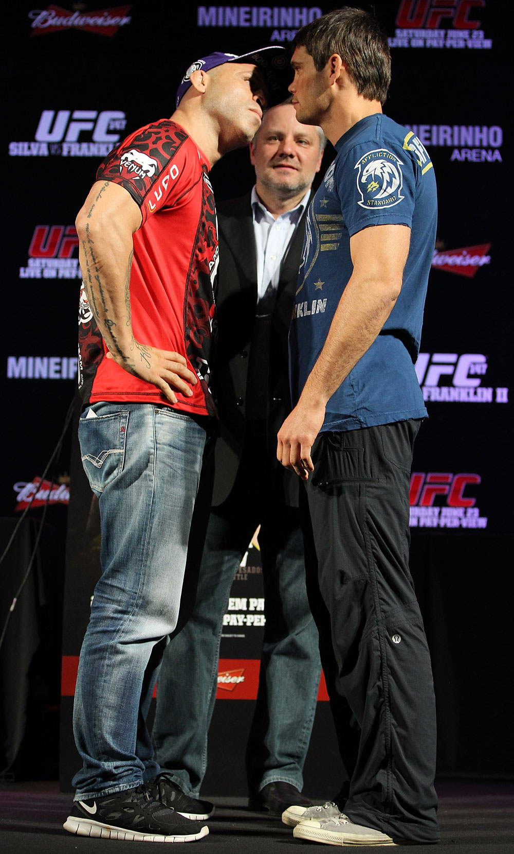 BELO HORIZONTE, BRAZIL - JUNE 21:   (L-R) Opponents Wanderlei Silva and Rich Franklin face off during the UFC 147 press conference at Ouro Minas Palace on June 21, 2012 in Belo Horizonte, Brazil.  (Photo by Josh Hedges/Zuffa LLC/Zuffa LLC via Getty Images)