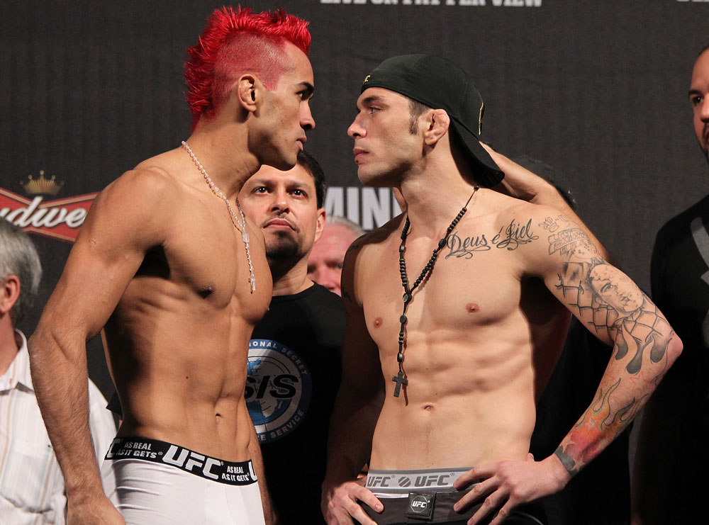 BELO HORIZONTE, BRAZIL - JUNE 22:   (L-R) Opponents Godofredo Pepey and Rony "Jason" Mariano Bezerra face off after making weight during the UFC 147 weigh in at Estadio Jornalista Felipe Drummond on June 22, 2012 in Belo Horizonte, Brazil.  (Photo by Josh Hedges/Zuffa LLC/Zuffa LLC via Getty Images)