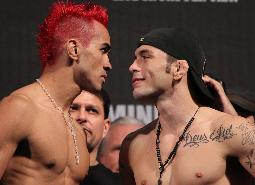 BELO HORIZONTE, BRAZIL - JUNE 22:   (L-R) Opponents Godofredo Pepey and Rony "Jason" Mariano Bezerra face off after making weight during the UFC 147 weigh in at Estadio Jornalista Felipe Drummond on June 22, 2012 in Belo Horizonte, Brazil.  (Photo by Josh Hedges/Zuffa LLC/Zuffa LLC via Getty Images)
