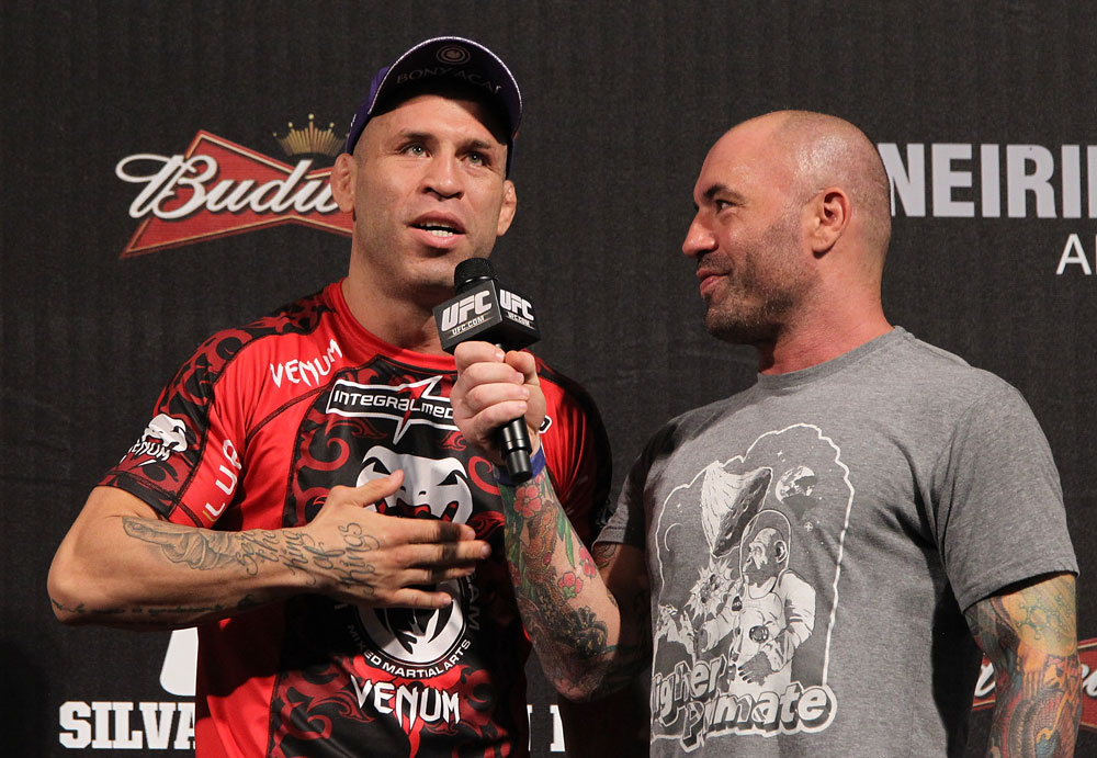 BELO HORIZONTE, BRAZIL - JUNE 22:   (L-R) Wanderlei Silva is interviewed by Joe Rogan after making weight during the UFC 147 weigh in at Estadio Jornalista Felipe Drummond on June 22, 2012 in Belo Horizonte, Brazil.  (Photo by Josh Hedges/Zuffa LLC/Zuffa LLC via Getty Images)