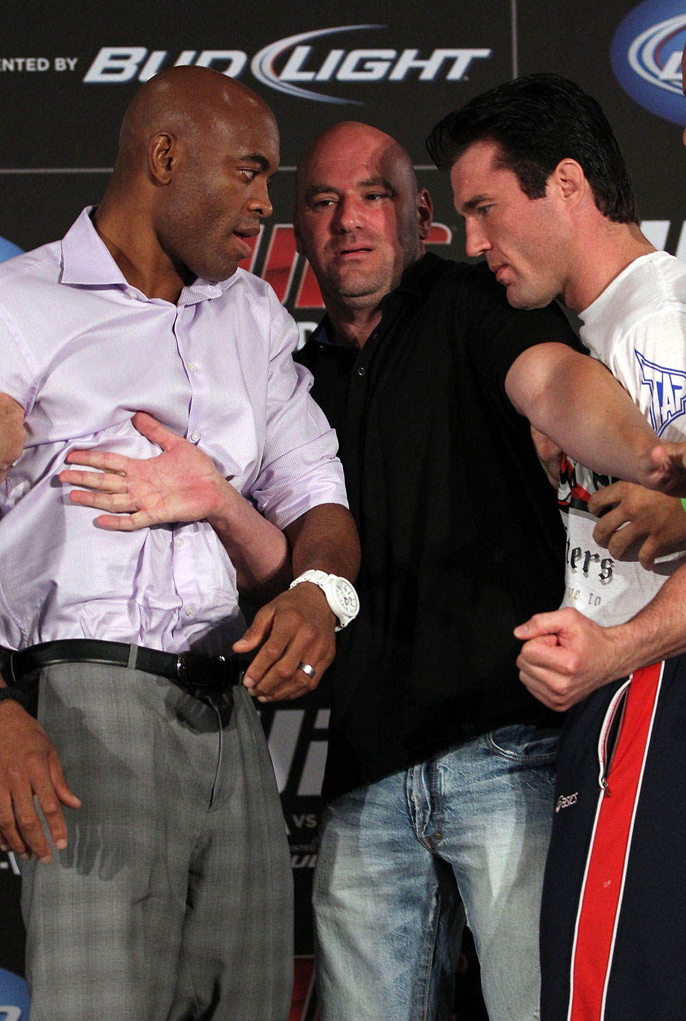 LAS VEGAS, NV - JULY 3:   (L-R) Opponents Anderson Silva and Chael Sonnen are separated by UFC President Dana White during the UFC 148 press conference at Lagasse's Stadium inside The Palazzo on July 3, 2012 in Las Vegas, Nevada.  (Photo by Josh Hedges/Zuffa LLC/Zuffa LLC via Getty Images)