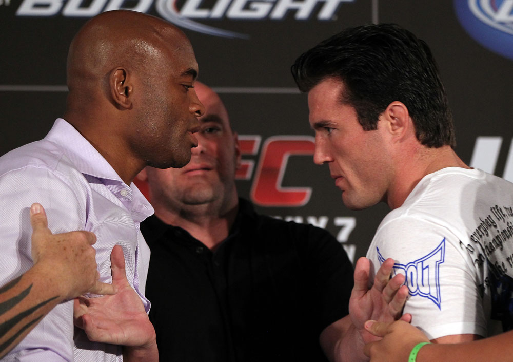 LAS VEGAS, NV - JULY 3:   (L-R) Opponents Anderson Silva and Chael Sonnen are separated by UFC President Dana White during the UFC 148 press conference at Lagasse's Stadium inside The Palazzo on July 3, 2012 in Las Vegas, Nevada.  (Photo by Josh Hedges/Zuffa LLC/Zuffa LLC via Getty Images)