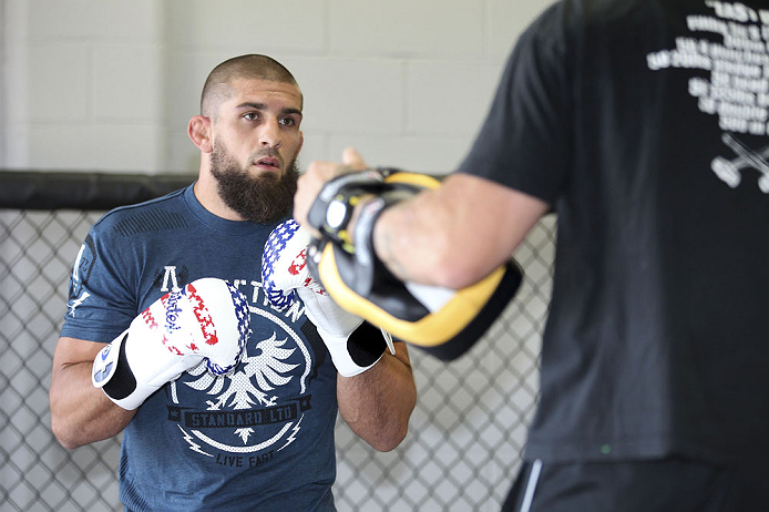 CALGARY, CANADA - JULY 18: Court McGee works out for the fans and media during the UFC 149 Open Workouts inside Champion's Creed Gym on July 18, 2012 in Calgary, Alberta, Canada. (Photo by Jeff Bottari/Zuffa LLC/Zuffa LLC via Getty Images)