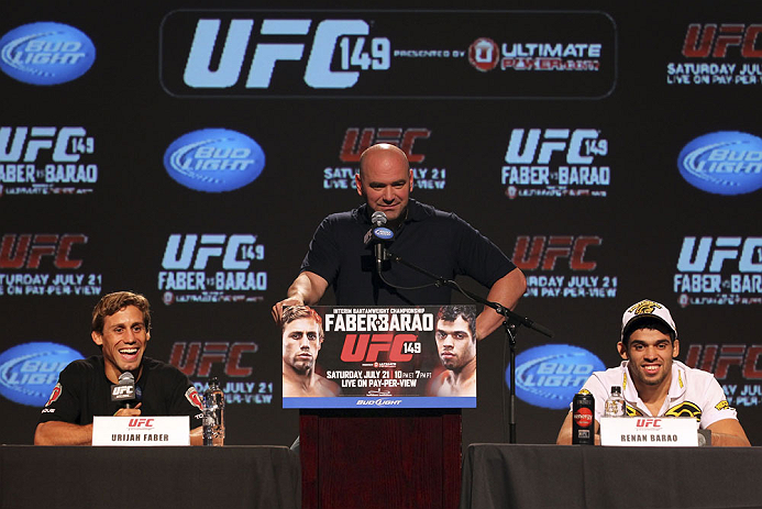 CALGARY, CANADA - JULY 19: (L-R) Urijah Faber, UFC President Dana White and Renan Barao attend the UFC 149 press conference at the Flames Central Sports Club on July 19, 2012 in Calgary, Alberta, Canada. (Photo by Jeff Bottari/Zuffa LLC/Zuffa LLC via Getty Images)
