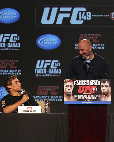 CALGARY, CANADA - JULY 19: Urijah Faber and UFC President Dana White share a moment on stage at the UFC 149 press conference at the Flames Central Sports Club on July 19, 2012 in Calgary, Alberta, Canada. (Photo by Jeff Bottari/Zuffa LLC/Zuffa LLC via Getty Images)