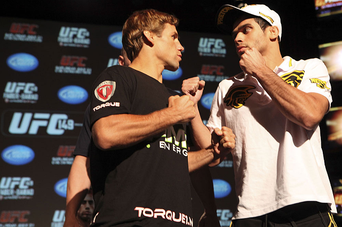 CALGARY, CANADA - JULY 19: Urijah Faber and Renan Barao square off at the UFC 149 press conference at the Flames Central Sports Club on July 19, 2012 in Calgary, Alberta, Canada. (Photo by Jeff Bottari/Zuffa LLC/Zuffa LLC via Getty Images)