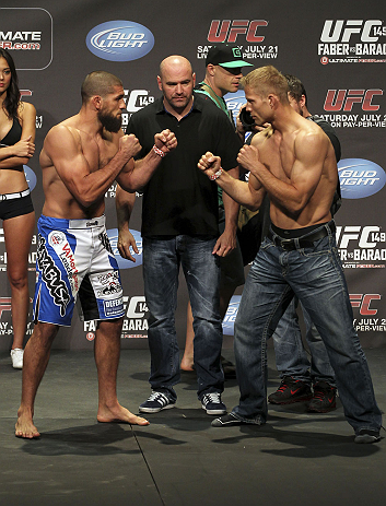 CALGARY, CANADA - JULY 20:  Court McGee and Nick Ring face off at the UFC 149 weigh-in at the Scotiabank Saddledome on July 20, 2012 in Calgary, Alberta, Canada.  (Photo by Jeff Bottari/Zuffa LLC/Zuffa LLC via Getty Images)