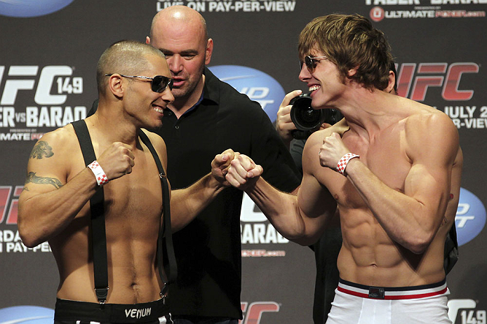 CALGARY, CANADA - JULY 20:  Chris Clements and Matthew Riddle face off at the UFC 149 weigh-in at the Scotiabank Saddledome on July 20, 2012 in Calgary, Alberta, Canada.  (Photo by Jeff Bottari/Zuffa LLC/Zuffa LLC via Getty Images)