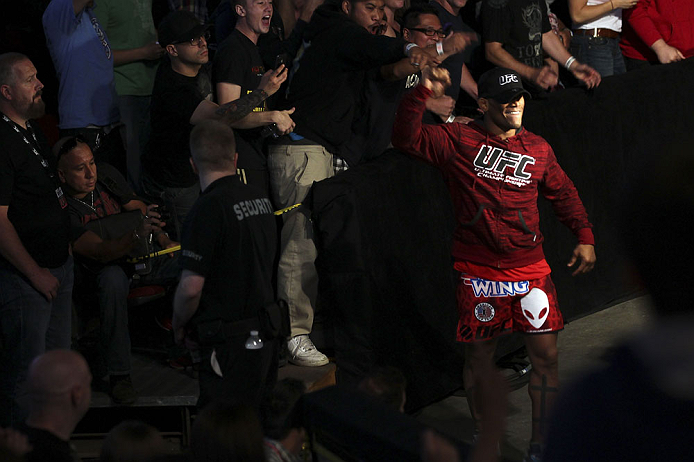 CALGARY, CANADA - JULY 20:  Hector Lombard waves to the crowd at the UFC 149 weigh-in at the Scotiabank Saddledome on July 20, 2012 in Calgary, Alberta, Canada.  (Photo by Jeff Bottari/Zuffa LLC/Zuffa LLC via Getty Images)