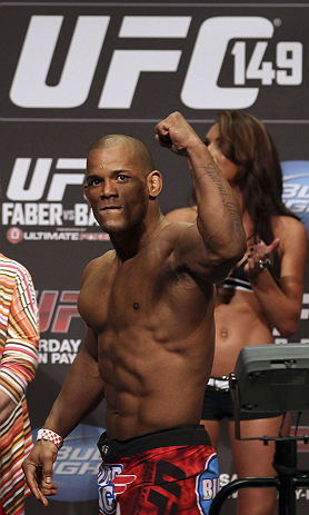 CALGARY, CANADA - JULY 20: Hector Lombard gestures to the crowd after he makes weight at the UFC 149 weigh-in at the Scotiabank Saddledome on July 20, 2012 in Calgary, Alberta, Canada.  (Photo by Jeff Bottari/Zuffa LLC/Zuffa LLC via Getty Images)