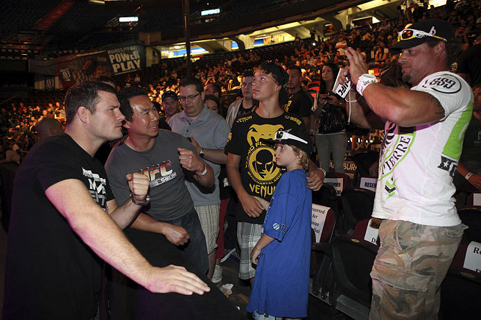 CALGARY, CANADA - JULY 20:  Michael Bisping poses for pictures after a Q&A session with the fans prior to the UFC 149 weigh-in at the Scotiabank Saddledome on July 20, 2012 in Calgary, Alberta, Canada.  (Photo by Jeff Bottari/Zuffa LLC/Zuffa LLC via Getty Images)