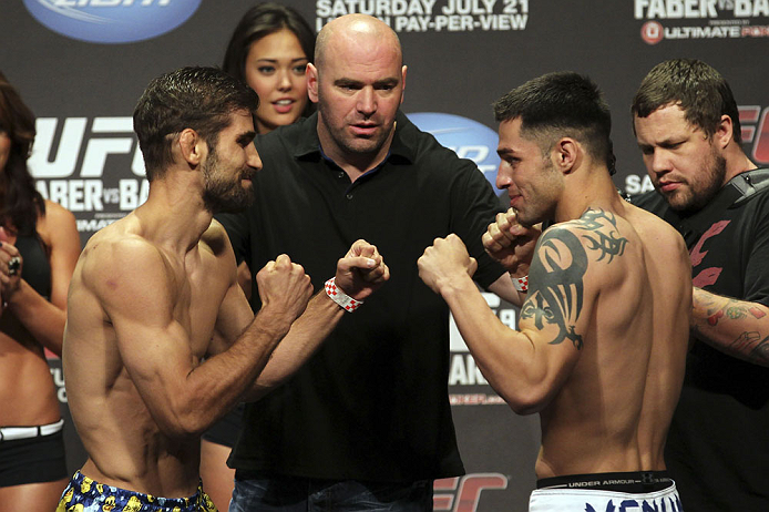 CALGARY, CANADA - JULY 20:  Antonio Carvalho and Daniel Pineda face off at the UFC 149 weigh-in at the Scotiabank Saddledome on July 20, 2012 in Calgary, Alberta, Canada.  (Photo by Jeff Bottari/Zuffa LLC/Zuffa LLC via Getty Images)