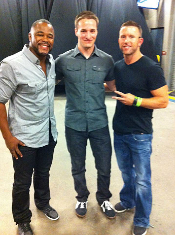 DENVER, CO - AUGUST 11:  UFC fighter Rashad Evans with Muscle Pharm's Jeremy DeLuca and the winner of their UFC 150 sweepstakes attends UFC 150 inside Pepsi Center on August 11, 2012 in Denver, Colorado. (Photos by Zuffa LLC)