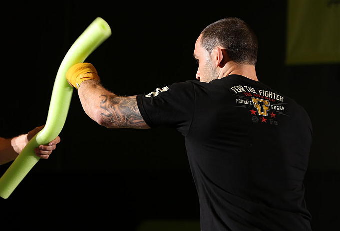 DENVER, CO - AUGUST 08:  Frankie Edgar works out for the media during the UFC 150 open workouts at the Muscle Pharm Sports Science Center on August 8, 2012 in Denver, Colorado. (Photo by Josh Hedges/Zuffa LLC/Zuffa LLC via Getty Images)