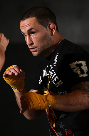 DENVER, CO - AUGUST 08:  Frankie Edgar works out for the media during the UFC 150 open workouts at the Muscle Pharm Sports Science Center on August 8, 2012 in Denver, Colorado. (Photo by Josh Hedges/Zuffa LLC/Zuffa LLC via Getty Images)