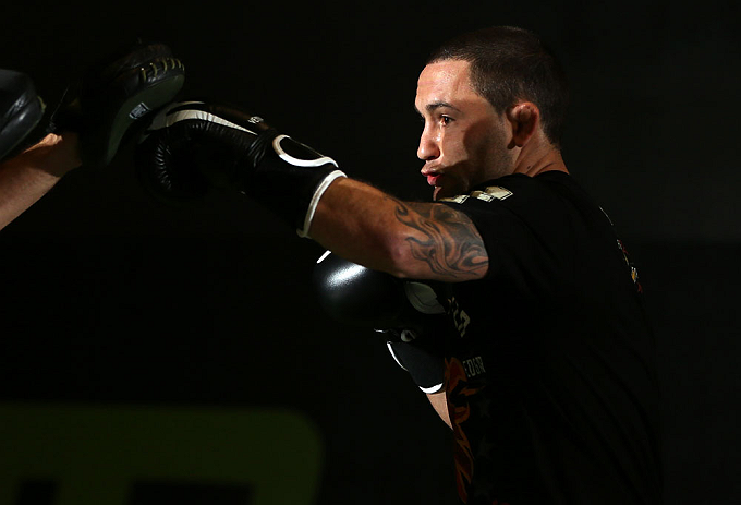 DENVER, CO - AUGUST 08:  Frankie Edgar works out for the media during the UFC 150 open workouts at the Muscle Pharm Sports Science Center on August 8, 2012 in Denver, Colorado. (Photo by Josh Hedges/Zuffa LLC/Zuffa LLC via Getty Images)