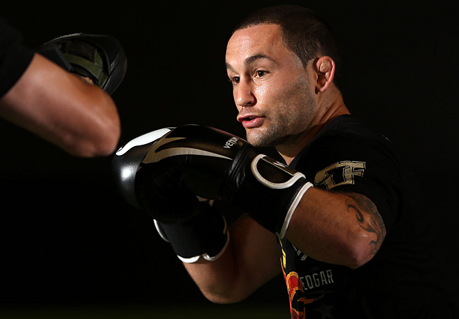 DENVER, CO - AUGUST 08:  Frankie Edgar works out for the media during the UFC 150 open workouts at the Muscle Pharm Sports Science Center on August 8, 2012 in Denver, Colorado. (Photo by Josh Hedges/Zuffa LLC/Zuffa LLC via Getty Images)